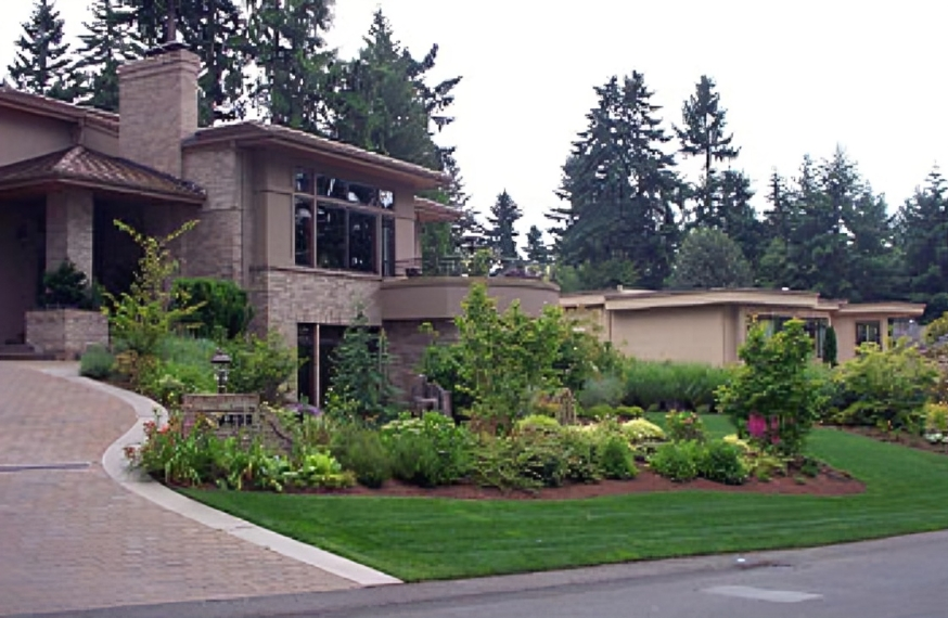 Modern house with landscaped front yard.